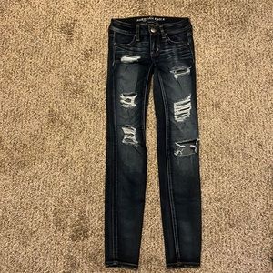 American Eagle super low dark wash distress jeggings